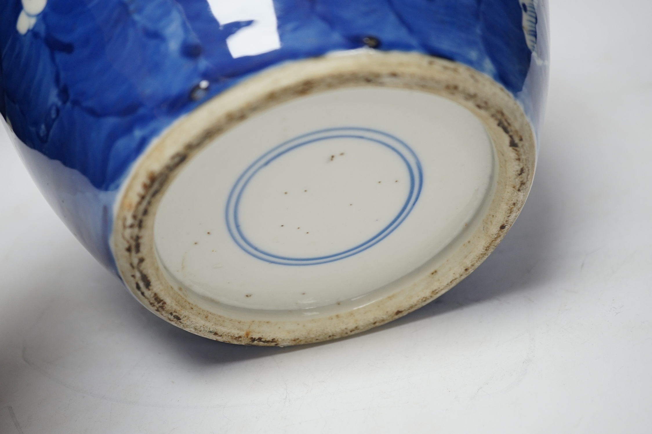 A late 19th century Chinese blue and white prunus jar and cover, 34cm high
